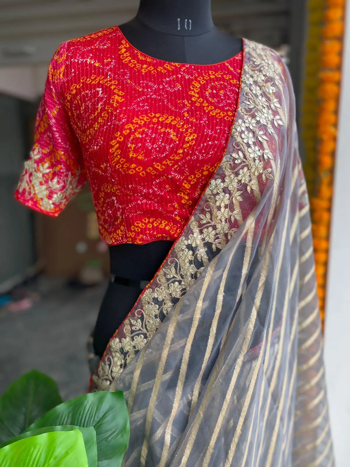 Grey organza saree with chiffon embroidery blouse