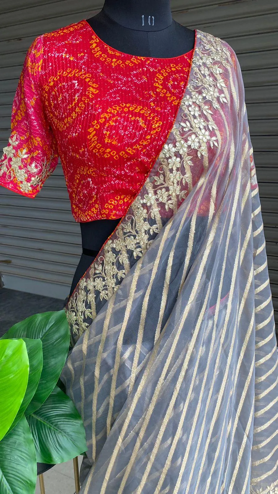 Grey organza saree with chiffon embroidery blouse